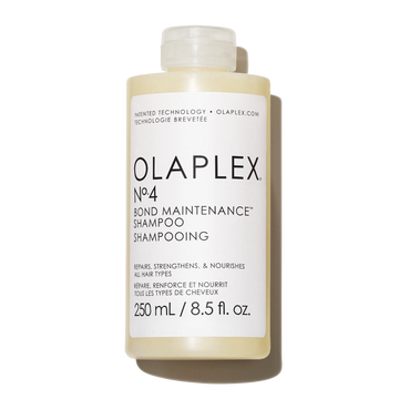 בקבוק שמפו משקם ומקבע קשרים מולקולריים אולפלקס מספר 4 OLAPLEX Nº.4 Bond Maintenance Shampoo להזנה עמוקה, ברק פנומנלי ומניעת שבירה, 250 מ"ל בעיצוב שחור ולבן