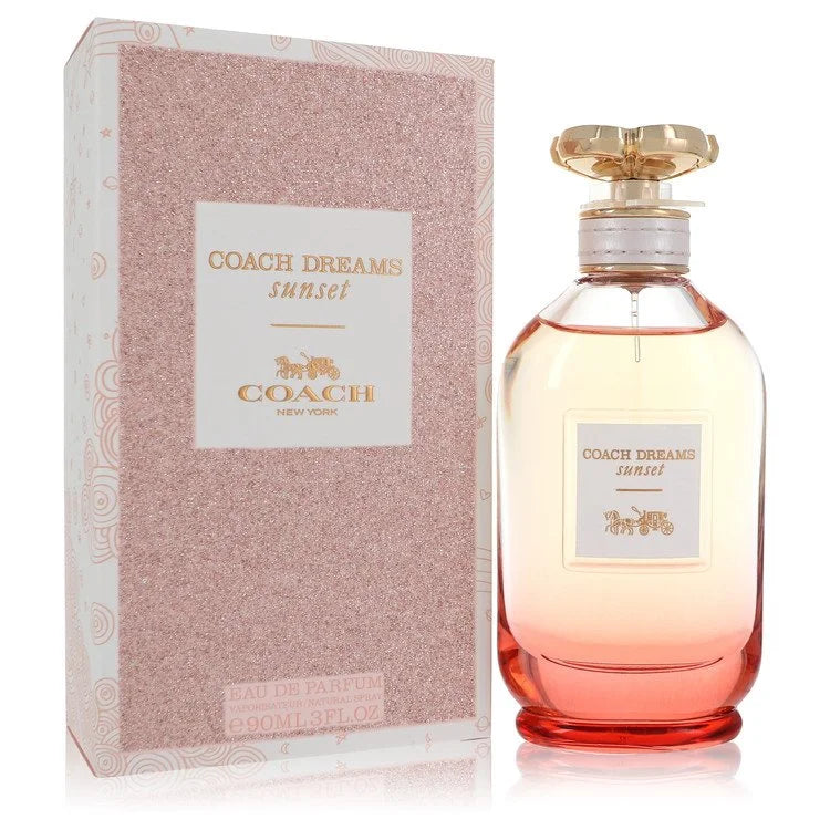 בושם יוקרתי ואצילי לאישה Coach Dreams Sunset Eau de Parfum בבקבוק זכוכית בגווני שקיעה מדורגים וניחוח וניל ויסמין קסום
