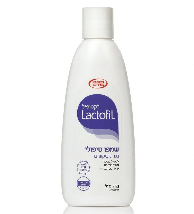 בקבוק לקטופיל שמפו טיפולי נגד קשקשים Lactofil Anti-Dandruff Therapeutic Shampoo בנפח 250 מ"ל, המיועד לטיפול בשיער ובקרקפת עדין, יבש ומגורה, מכיל רכיבי חלב פעילים ללא פרבנים, מעוצב בצבעי כחול כהה ואדום קליניים.