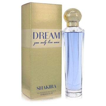בושם Shakira Dream לאישה - או דה טואלט בבקבוק טורקיז וזהב המקרין רעננות של תפוז דם, ורד וקרמל ממכר.