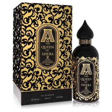 בקבוק בושם The Queen of Sheba של Attar Collection בעיצוב שחור ומוזהב מפואר, המקרין עוצמה של אפרסק וטבק, תחכום של ורד אדום וניחוח ענבר עמוק ועמיד לאישה.